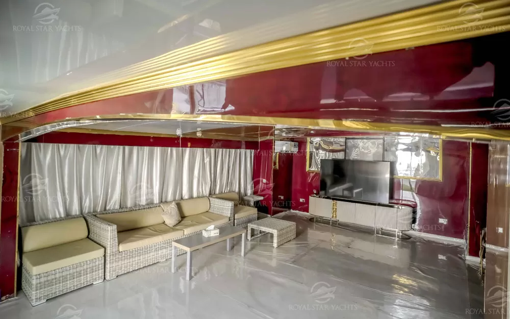 Luxurious indoor lounge with sofas and TV