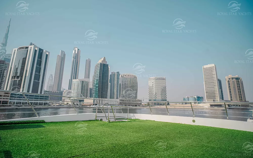 Spacious outdoor sundeck with artificial grass on 100 FT Dream yacht