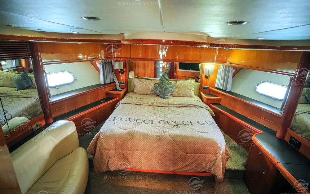 Master bedroom with double bed inside 90 FT Sunseeker yacht