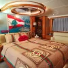 Guest bedroom with designer interiors inside 90 FT Sunseeker yacht