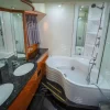 Modern bathroom with shower and Jacuzzi on 90 FT Sunseeker