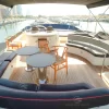 Flybridge seating and dining space on 90 FT Sunseeker yacht