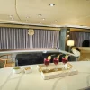 Dining table with drinks setup inside 90 FT Sunseeker yacht