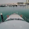 Front bow view of 75 FT Mayyas yacht docked in Dubai Marina