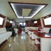 Spacious lounge with white leather sofas inside 75 FT Mayyas yacht