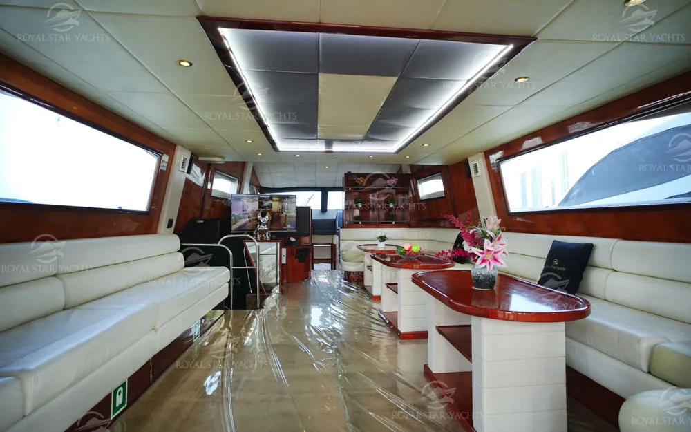 Spacious lounge with white leather sofas inside 75 FT Mayyas yacht