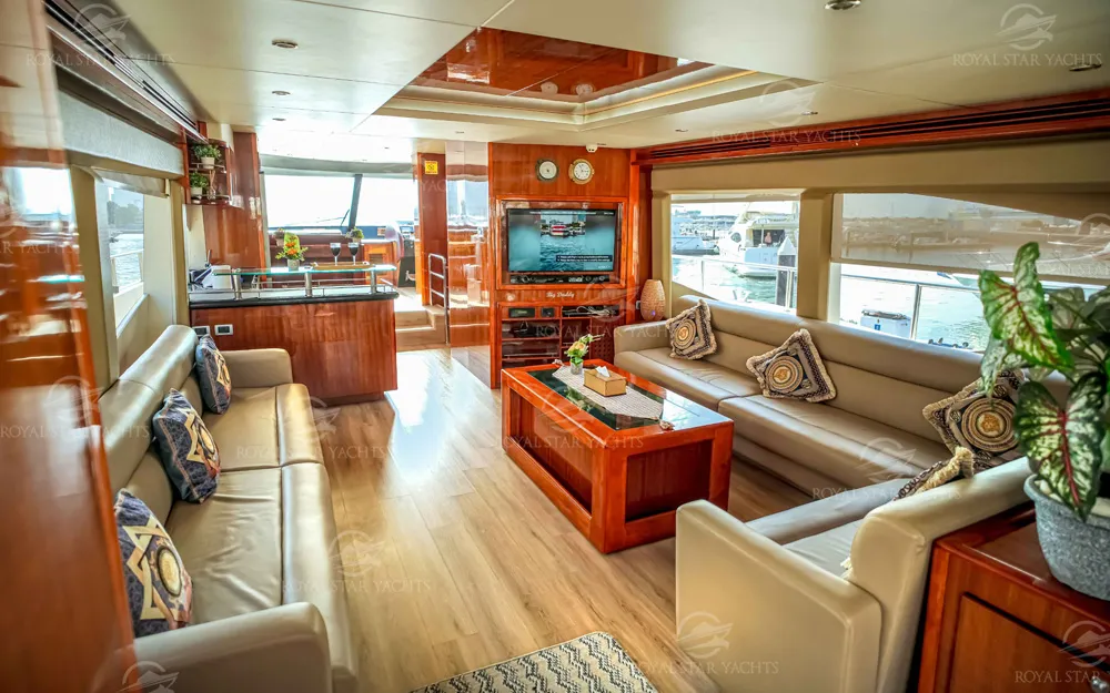 Elegant indoor salon with wooden finish on 90 FT Big Daddy yacht