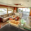 Spacious indoor lounge with sofas on 90 FT Big Daddy yacht