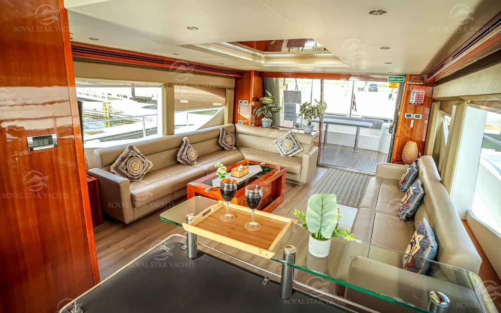 Spacious indoor lounge with sofas on 90 FT Big Daddy yacht