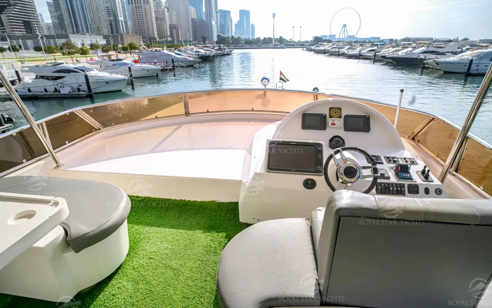Captain’s cockpit and flybridge seating on 90 FT Big Daddy yacht