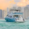 59 FT Majesty yacht sailing with Dubai skyscrapers in background
