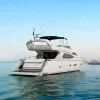 Rear view of 68 FT Luna yacht on water.