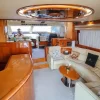 Spacious lounge with sofas inside 68 FT Luna yacht.