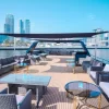 Playboy yacht rooftop deck with luxury seating
